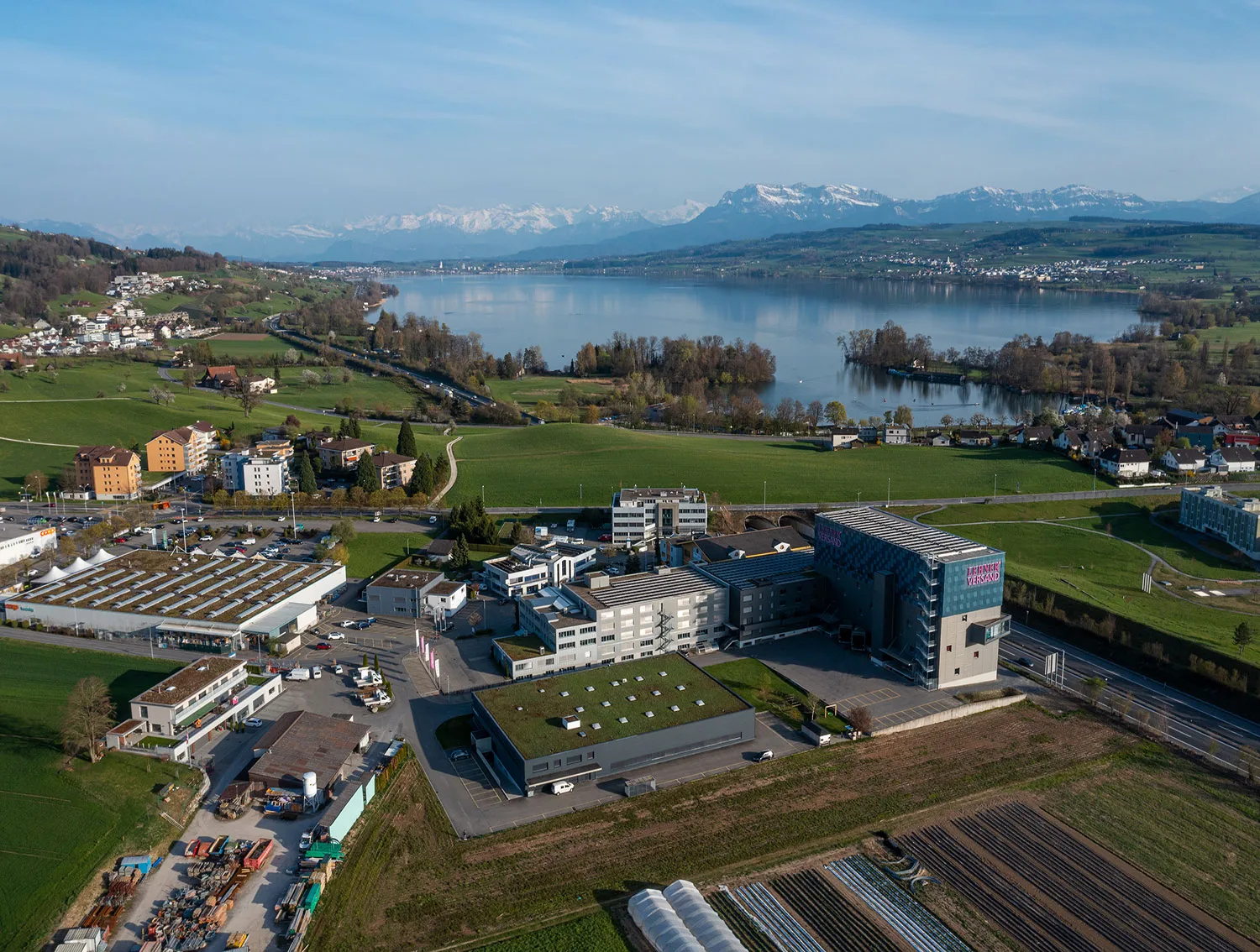 Aerial view of the Lehner Versand headquarters by the lake