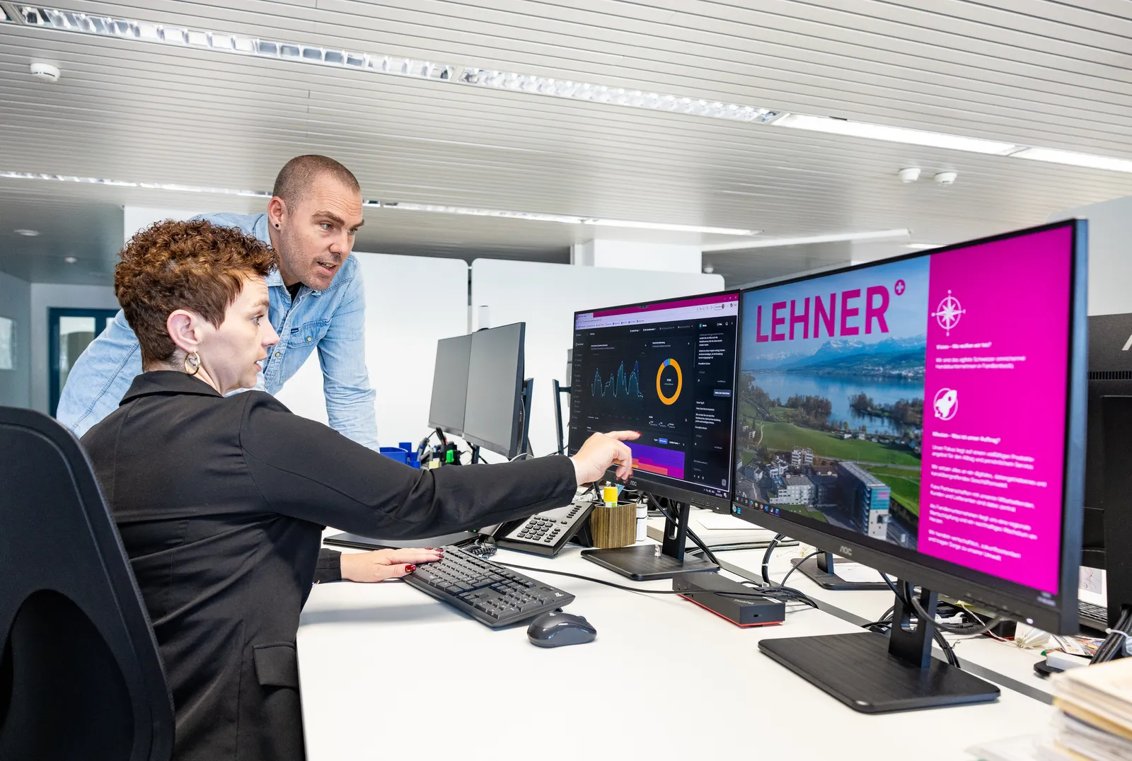 Jacqueline Schaller and Mario Hähni reviewing service performance on the Typewise dashboard